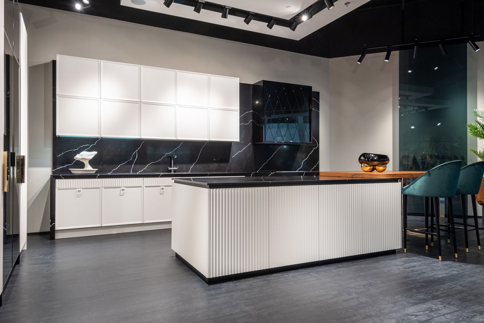 A bright home kitchen with a built-in range and hood — professional Fisher & Paykel service